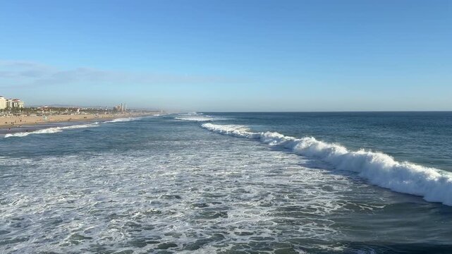 View of Large Ocean Waves at Huntington Beach California in Late Afternoon
