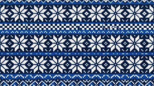 A festive blue and white Fair Isle knitted pattern featuring intricate snowflake motifs and geometric stripes, perfect for cozy winter holiday designs