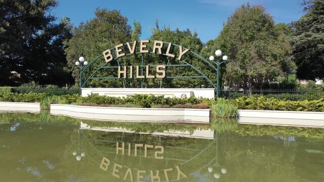 A city park sign and lily pond in Beverly Hills California