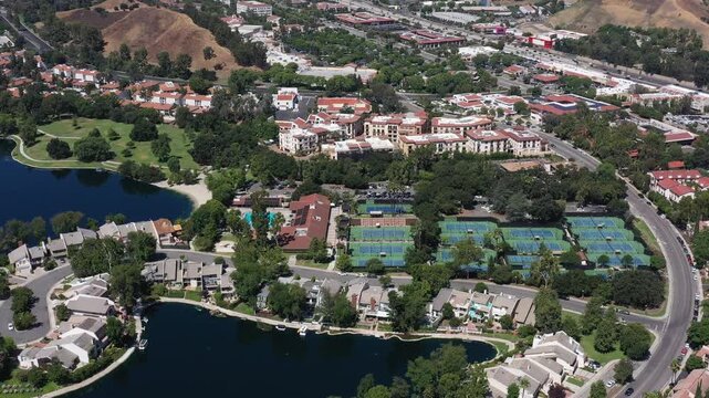 Aerial view of a residential community and lake in Calabasas