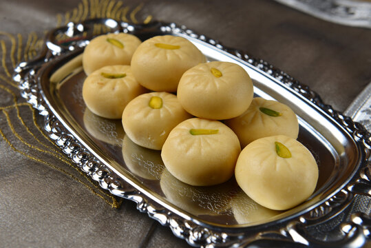 Pedha- A tray full of popular indian sweet made with condensed milk. indian sweets and desserts.