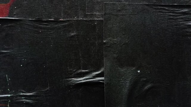 Wrinkled black paper poster texture animated stop motion background