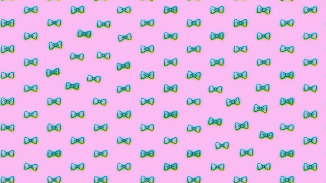 Seamless pattern of bow ties on pink background
