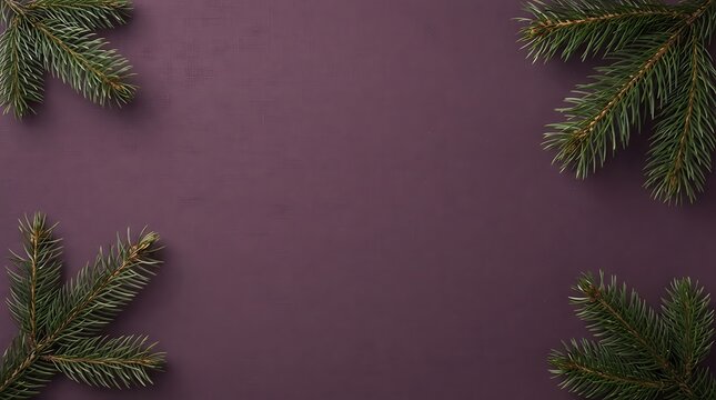 Tropical leaves frame on dusty rose background with copy space