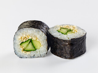 Black nori seaweed wrap, Asian cucumber maki sushi roll with white rice and sesame seeds, Japanese snack © Andrei Starostin