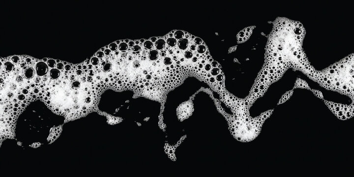 Abstract wave of soapy foam bubbles on black background with cleansing detergent transparent freshness cosmetic close up sparkling effervescence moisture contrast