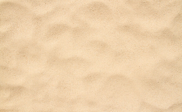 Sand beach texture background,Yellow sand background soft focus.