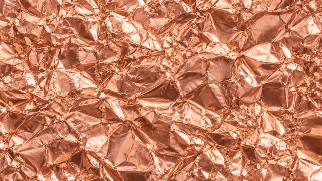 Rose gold crumpled foil texture with delicate micro wrinkles