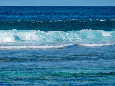 A wave in the ocean at Baie Lazar Beach on Mah&eacute;.