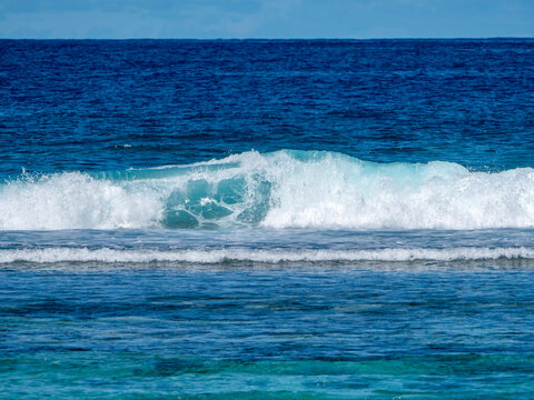 A wave in the ocean at Baie Lazar Beach on Mah&eacute;.