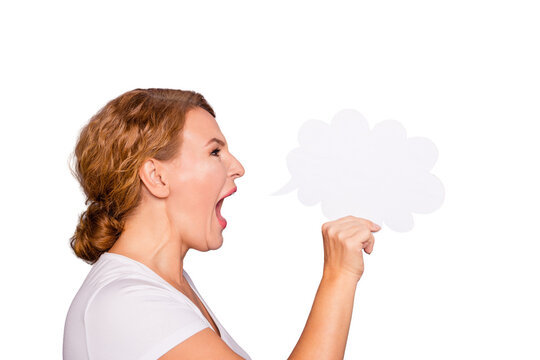 Close-up profile side view portrait of attractive mad angry wavy-haired lady in casual white t-shirt holding in hand cloud like mic isolated on gray violet purple pastel background
