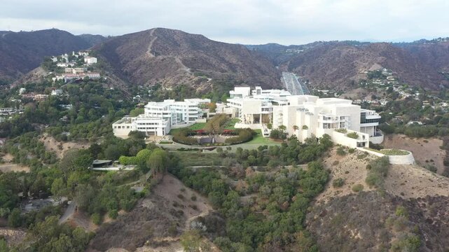 Aerial view of white museum buildings on a hill in Los Angeles