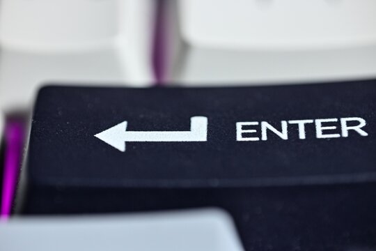 Close Up of Black Enter Keycap on Mechanical Keyboard with RGB Light