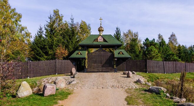 Wooden gates of the Skete of Saints Anthony and Theodosius of the Caves&mdash;an Orthodox male monastic hermitage established in 2009 on the outskirts of the village of Odrynki, in the Podlasie region.