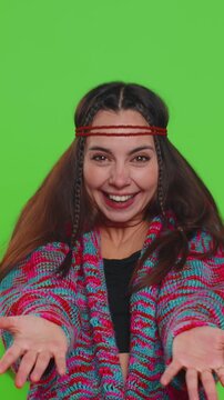 Amused hippie woman pointing finger to camera, laughing out loud, taunting making fun of ridiculous appearance, funny joke anecdote. Pretty lady isolated alone on chroma key background, green screen