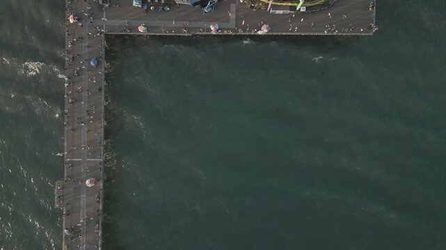 Top down aerial of a pier amusement park in Santa Monica