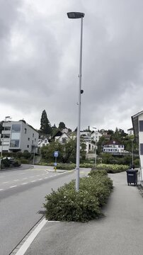 Quiet residential street with apartment buildings in Zurich