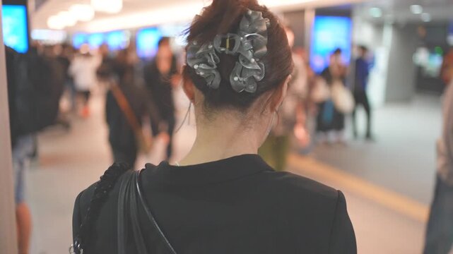 Urban Lifestyle Scene With Woman Walking Through Indoor Shopping Street, Slow Motion