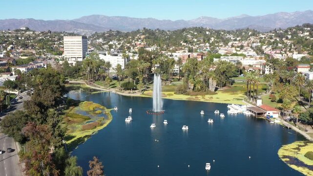 Aerial view of Echo Park Lake fountain and mountains