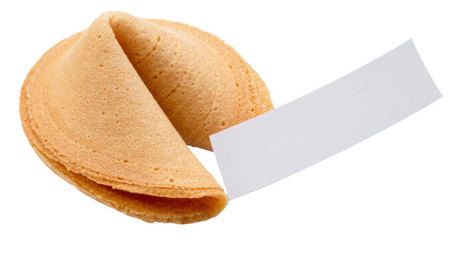 Isolated fresh baked golden fortune cookie with empty paper slip ready for a message