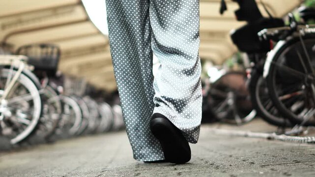 Walking Through Bicycle Parking Area, Slow Motion
