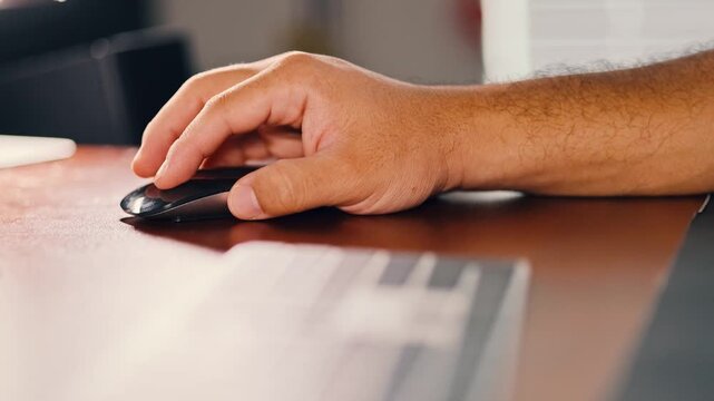 Hand Operating Computer Mouse Close Up