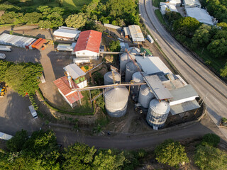 Aerial view of an industrial processing plant and storage silos in costa rica © STOCKEROcr