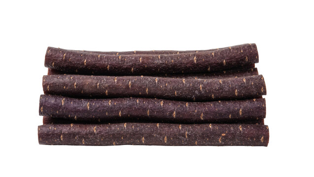Isolated Stack of dark brown pet chew sticks or dried biltong meat treats for animals