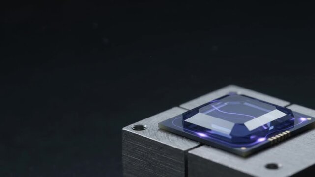 Static ultra macro close-up of synthetic sapphire quantum qubit resonator on titanium with subtle violet wave shimmer, clean dark copy space seamless loop