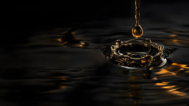 glossy crude oil surface with a single viscous drop falling