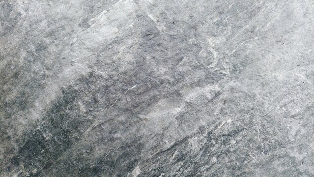 Grungy cement texture background. Spots of white paint on a gray concrete background, texture, photo. old cement