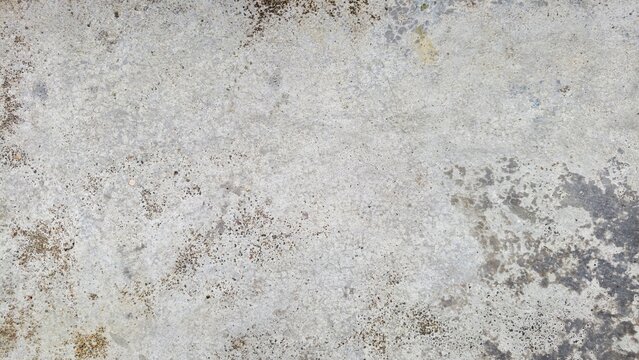 Grungy cement texture background. Spots of white paint on a gray concrete background, texture, photo. old cement