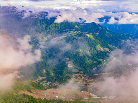 Aerial View of Misty Mountains and Agricultural Terraces in Nantou