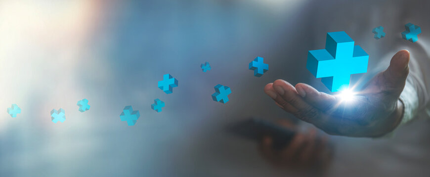 Business Value Addition and Growth Concept, Healthcare Protection, Benefit Plus, with Businessman Hand Holding Floating Blue Plus Signs.