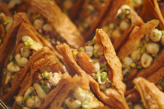 midye baklava filled with pistachios and nuts in closeup