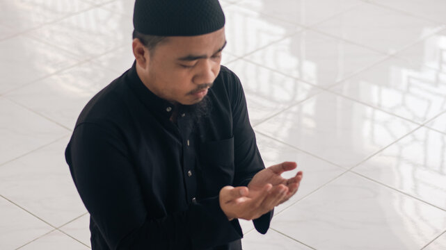 Muslim Man Praying Inside a Mosque
