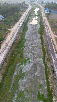 Aerial View of a Dried Canal in a Rural Landscape