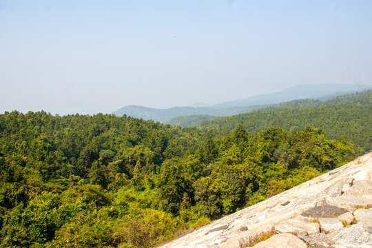 Explore the scenic Ayodhya Hills of Purulia, West Bengal, featuring lush green forests, winding roads, rocky mountains, and beautiful countryside landscapes.