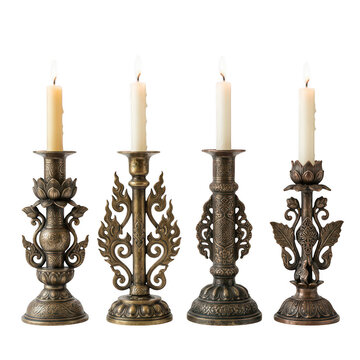 Elegant ornate brass candle holders with lotus designs isolated on transparent background
