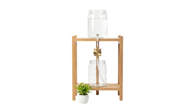 Cold brew coffee maker with wooden stand, glass drip coffee tower for slow brewing, minimalist wooden coffee station on white background