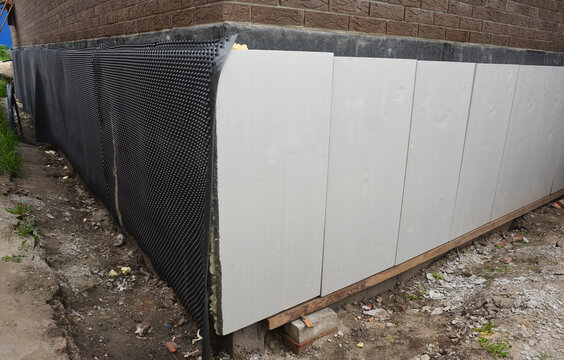 Foundation waterproofing insulation with installed on bottom support boards