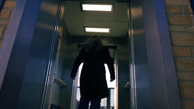 Elevator lift doors close on women
