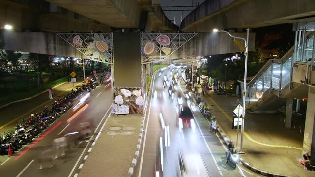 Timelapse of jakarta city downtown night illuminated traffic street around Blok M street Jakarta