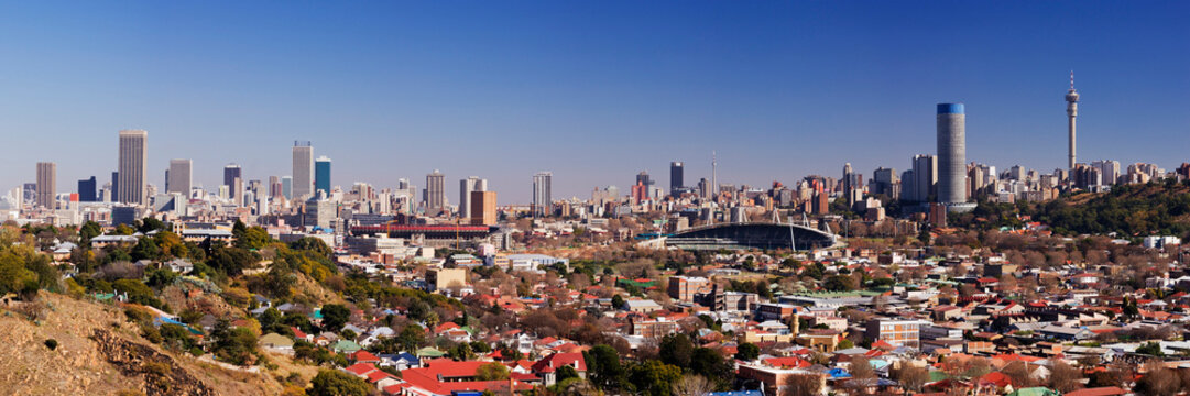 Johannesburg city skyline with stadium and tower south africa