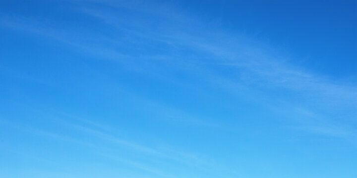 light blue sky background with soft clouds texture