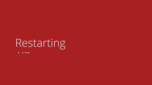 Restarting message with animated dots on red lock screen. Horizontal system animation shows reboot or update process for tech explainers and error state displays.