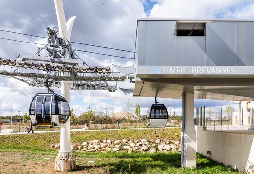 Limeil-Brevannes, France - Sep. 16, 2026: Cabins arriving and leaving the Limeil-Brevannes station on the Line 1 of the Ile-de-France cable car, called Cable 1 or C1, opened in 2025 in Paris suburbs.