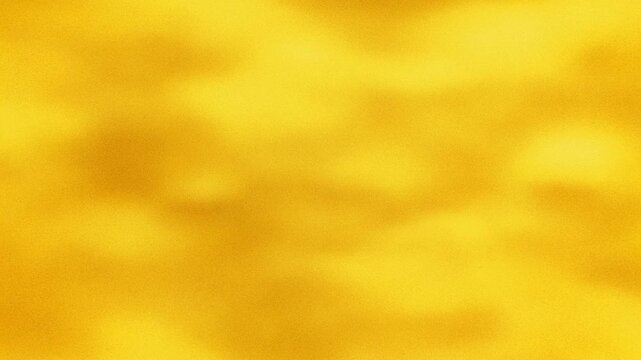 Intentionally blurred soft golden abstract forms drift across a warm yellow atmospheric background. Presentation backdrops, advertising graphics, and title cards.
