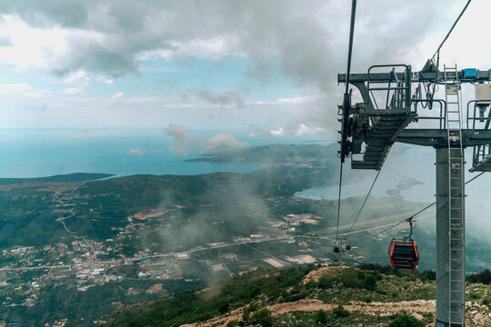 Aerial panoramic view of Kotor cable car in Montenegro with Tivat city and bay background