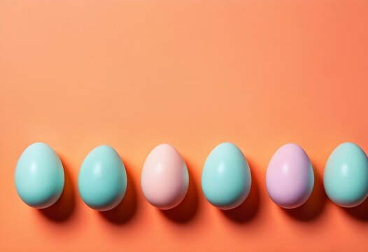 Pastel easter eggs on bright orange background, minimal